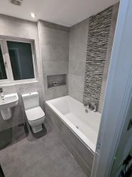 Bathroom renovation. Plumbing and tiling image 4