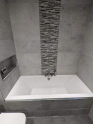 Bathroom renovation. Plumbing and tiling
