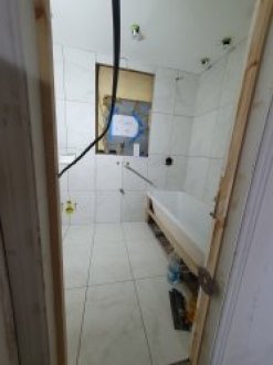 If you want to have a bathroom or kitchen covered to tiles or stone you need the professional tiler image 1