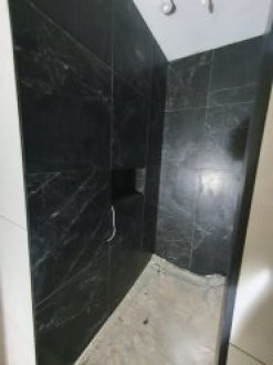 If you want to have a bathroom or kitchen covered to tiles or stone you need the professional tiler image 2